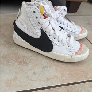 Nike Kids White High-Top Sneakers with Black Swoosh and Red Accent